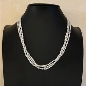 Dainty three strand keshi fresh water pearl necklace with gold tone clasp 18”